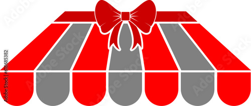 Store roof with red ribbon on top
