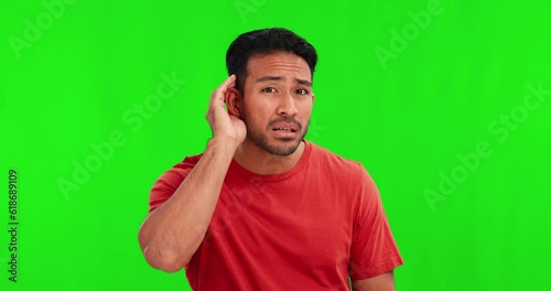 Green screen, man face and hand on ear for listen, huh or speak up expression on mockup background. Volume, portrait and asian male person with gesture for pardon, what or hearing, whisper or secret