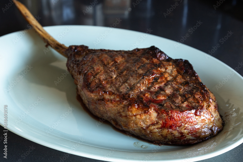 Tomahawk steak on plate
