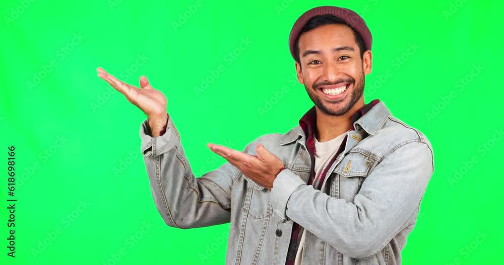 Man, portrait and showing a promotion in green screen with deal in studio background or product placement. Choice, hand gesture and male person is happy with decision or option with open palm.