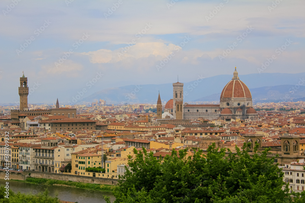 Florence cityscape and skyline panorama during summer time. Panoramic view of  Florence from Michelangelo Square, Tuscany. The wonderful artistic and historical Florence city in Italy. Travel scene.