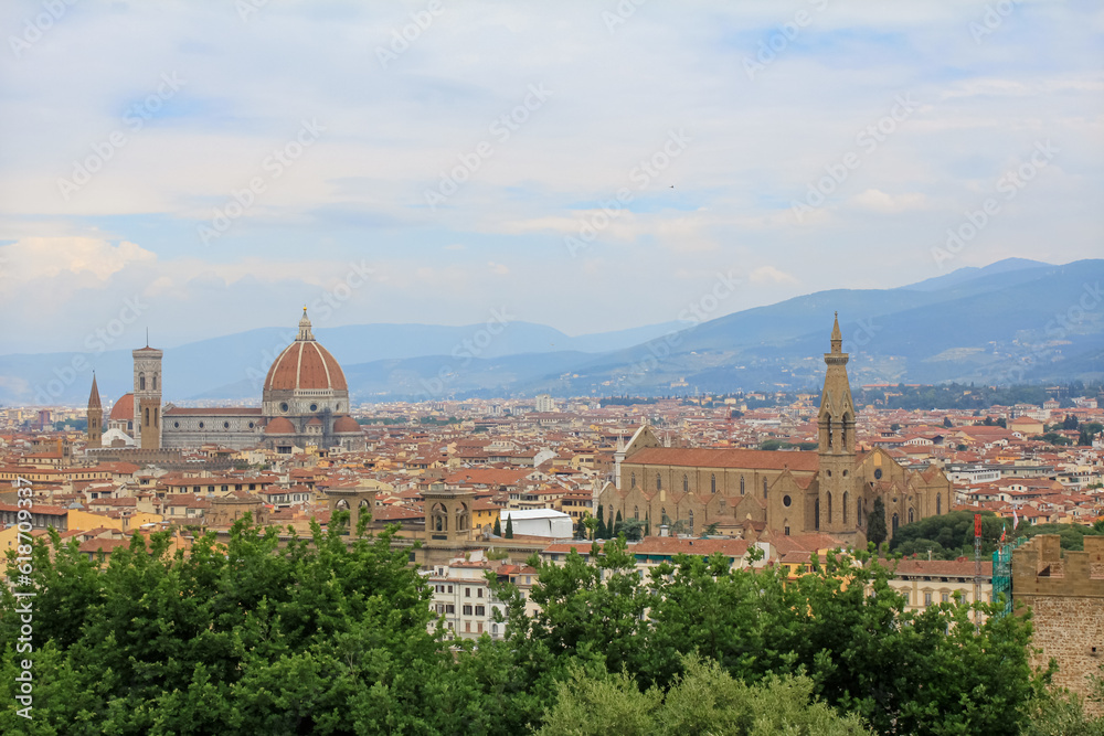Obraz premium Florence cityscape and skyline panorama during summer time. Panoramic view of Florence from Michelangelo Square, Tuscany. The wonderful artistic and historical Florence city in Italy. Travel scene.