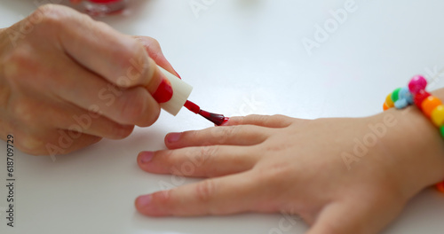 Mom paints her daughter s nails