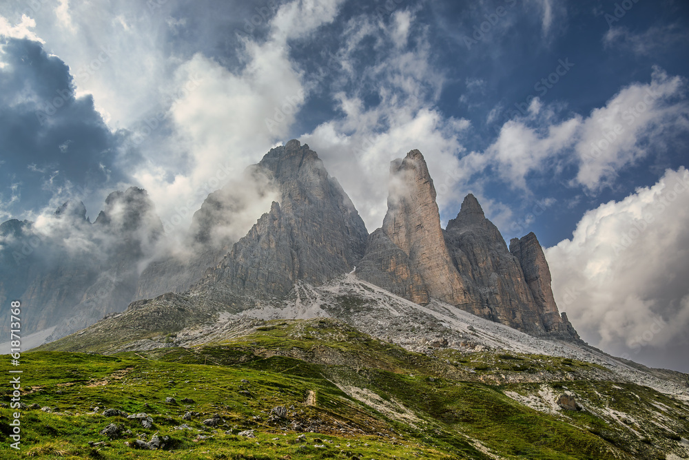 Fototapeta premium Floating clouds around the Tre Cime di Lavaredo peaks in the Italian Dolomites 