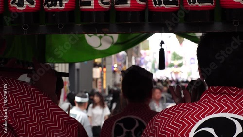 ASAKUSA, TOKYO, JAPAN - 21 MAY 2023 : Scenery of ASAKUSA SANJA MATSURI (Festival). Famous traditional festival in Tokyo. Japanese summer season concept video. Slow motion shot. photo