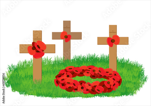 Cross with red flowers, wreath of red poppies. On Memorial Day, the grave and monument are decorated with a flower wreath. UK and Canadian date. Remembrance Sunday.