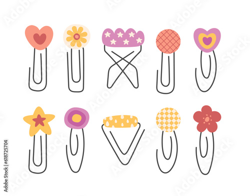 Paper clips set. Creative hand drawn stationery elements, pin with retro pattern, star shape, heart, flower, cloud. Metallic equipment for notes fix. Vector isolated illustration in retro style.