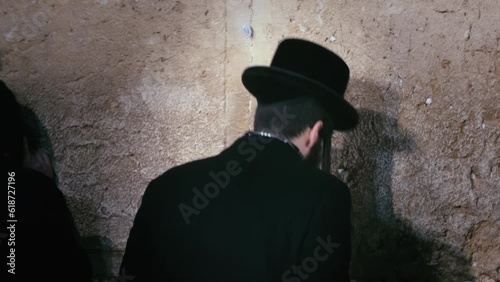 Orthodox Jew Engaged in Prayerful Mourning at the Wailing Wall