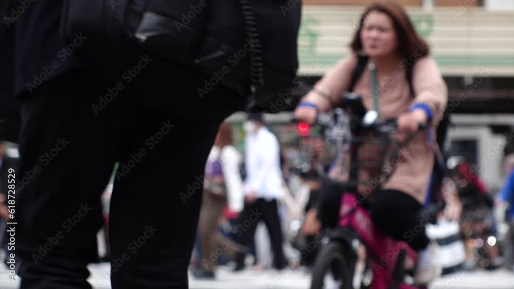 SHIBUYA, TOKYO, JAPAN -MAY 2023 : Slow motion shot of crowd of people walking at Shibuya crossing in daytime. Busy downtown area in Tokyo. Japanese people, urban city life and metropolis concept video SHIBUYA, TOKYO, JAPAN -MAY 2023 : Slow motion shot of crowd of people walking at Shibuya crossing in daytime. Busy downtown area in Tokyo. Japanese people, urban city life and metropolis concept video