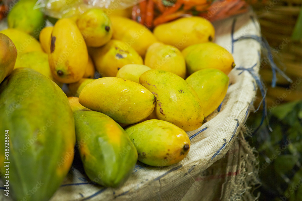 Tropical fruits on display at a Southeast Asian traditional market