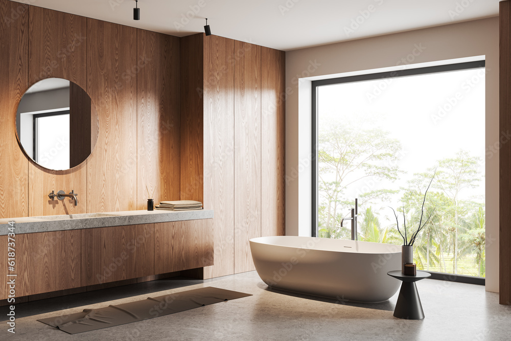 Light wooden bathroom corner with tub and sink