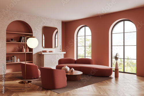 Pink living room corner with arch and sofa