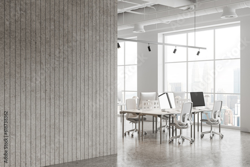 White and stone office interior with blank wall