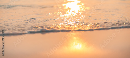 Fantastic closeup view of calm sea water waves with orange sunrise sunset sunlight. Island coast meditation  inspiration peaceful. Summer vacation  holiday amazing nature decoration. Relax ocean