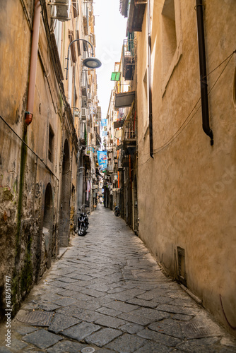 Narrow city street in the historical center of Naples.
