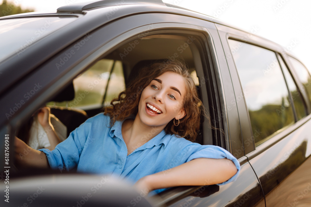 Two Young woman is resting and enjoying the trip in the car Automobile journey, traveling, lifestyle concept. Car sharing. Two Young woman is resting and enjoying the trip in the car Automobile journey, traveling, lifestyle concept. Car sharing.