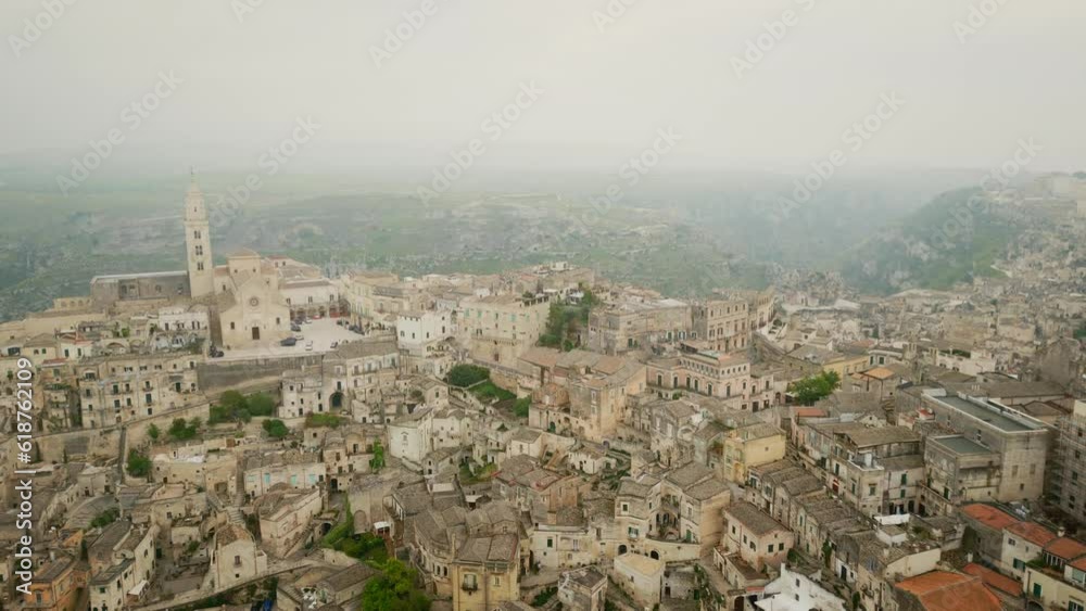 Aerial of the old buildings of Matera city in Italy during the daytime Aerial of the old buildings of Matera city in Italy during the daytime