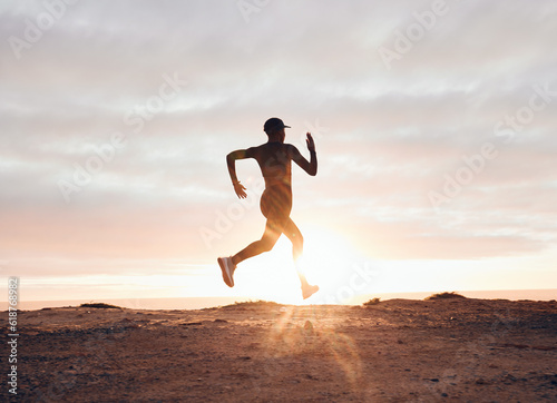 Sunset, running and silhouette with woman in nature for health, workout and fitness challenge. Performance, sports and exercise with runner training in outdoor for speed, marathon and wellness mockup