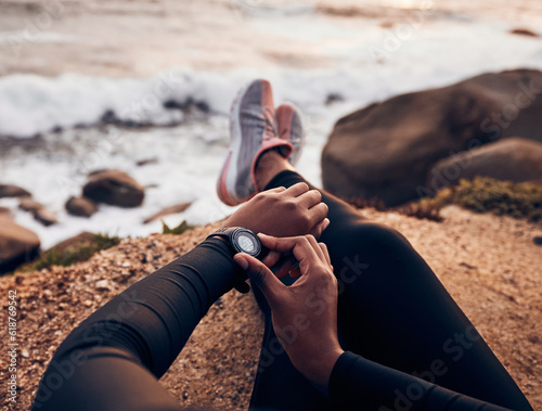 Obraz na plátně Relax, check and smart watch with hand of woman on rock for running, fitness tracker and heart rate