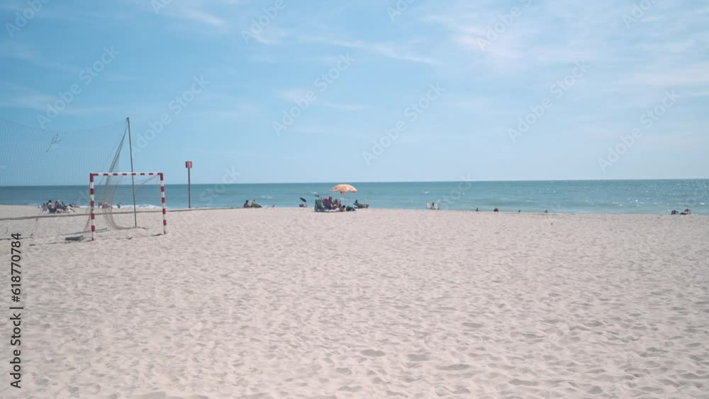 Beautiful view of a bright tranquil sandy beach during daytime Beautiful view of a bright tranquil sandy beach during daytime