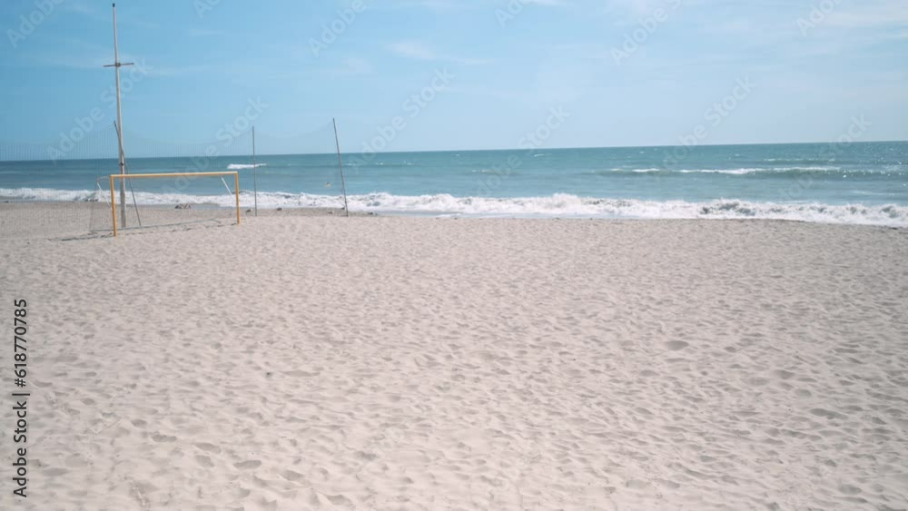 Beautiful view of a bright tranquil sandy beach during daytime Beautiful view of a bright tranquil sandy beach during daytime