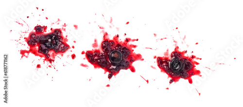 Smashed black currant berries isolated on white background