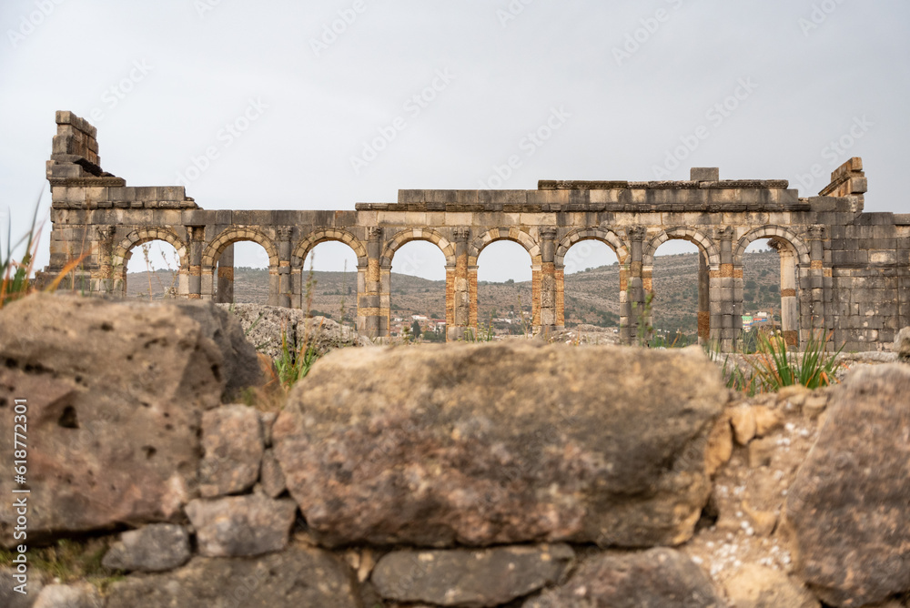 Iconic ruins of the forum in Volubilis, an old ancient Roman city in Morocco