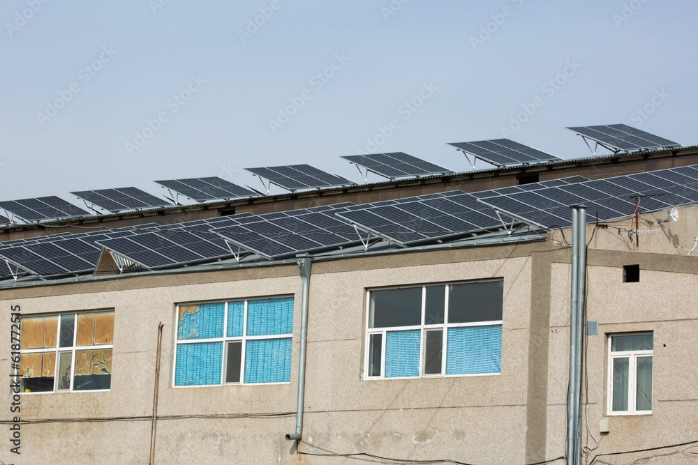 View of a cluster of solar panels on a sunny day