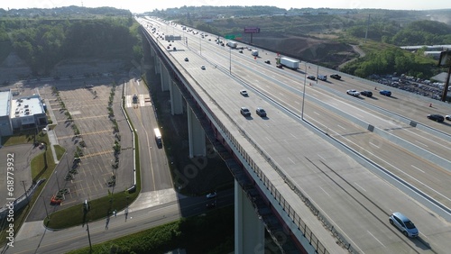 Aerial view of vehicles traveling along a highway road on the Valley View Bridge