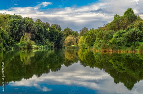 Landscape of Cherokee Lake surrounded by greenery in Louisville  Kentucky