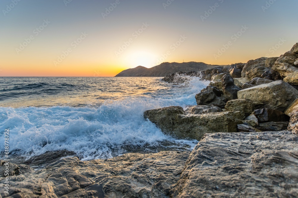 Mesmerizing view of a beautiful seascape during sunrise in Crete, Greece Mesmerizing view of a beautiful seascape during sunrise in Crete, Greece