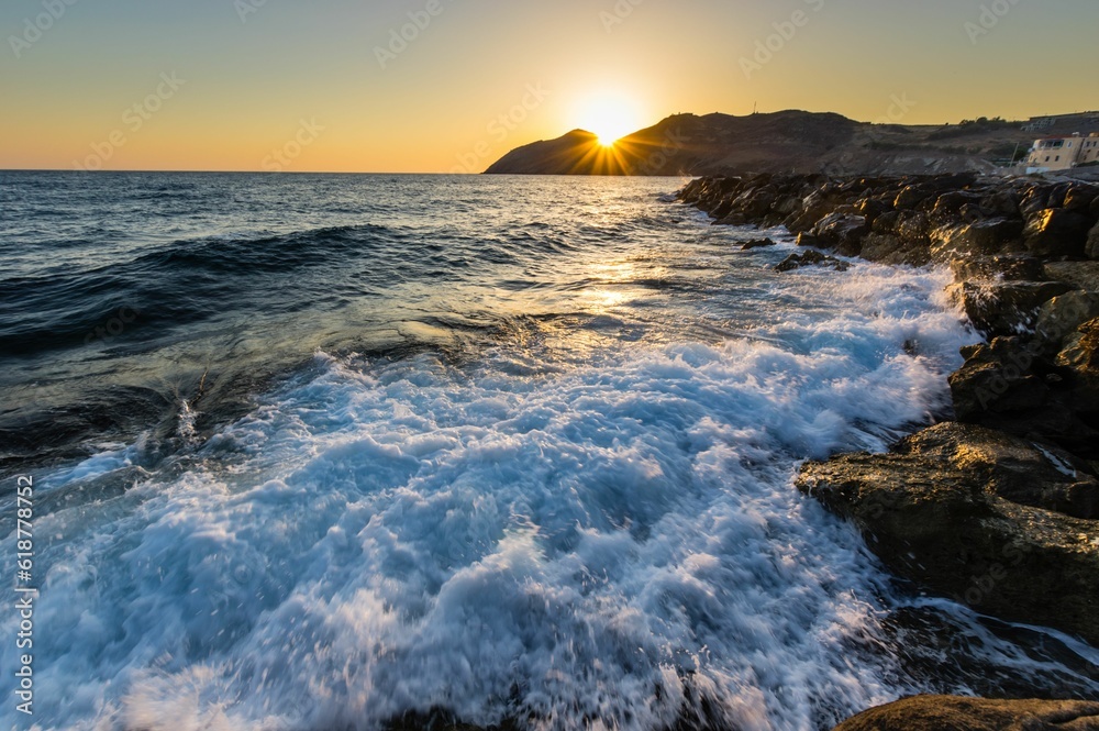 Mesmerizing view of a beautiful seascape during sunrise in Crete, Greece
