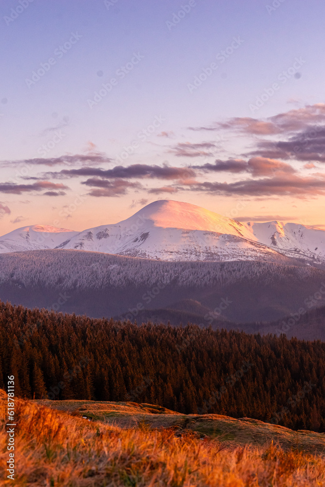 landscape in the mountains, sunset, view of the snowy peak of Mount Petros, Hoverla, Montenegrin mountain range, travel, screensaver, poster, poster, cover, print, spring, winter