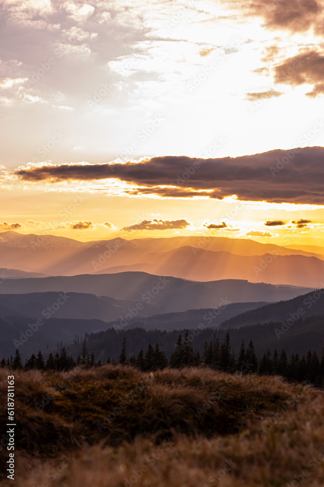 Fototapeta premium landscape in the mountains, sunset, silhouettes of peaks, Montenegrin mountain range, Carpathians, travel, screensaver, poster, poster, cover, print, spring, winter