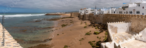 Scenic view of picturesque city center of Asilah, seen from the Marabout of Sidi Ahmad Mansour in Morocco photo
