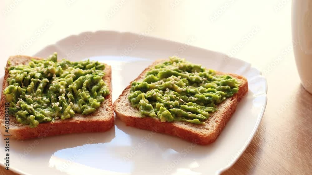 Avocado toast lying on a plate Avocado toast lying on a plate