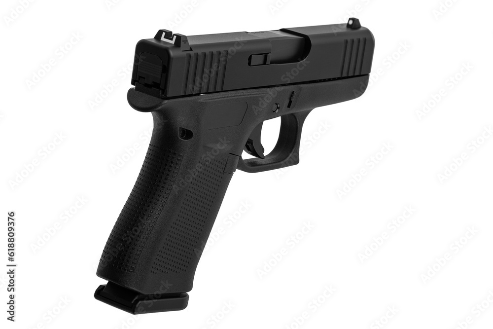 Modern semi-automatic pistol isolate on a white background. Armament for the army and police. Short-barreled weapon Modern semi-automatic pistol isolate on a white background. Armament for the army and police. Short-barreled weapon