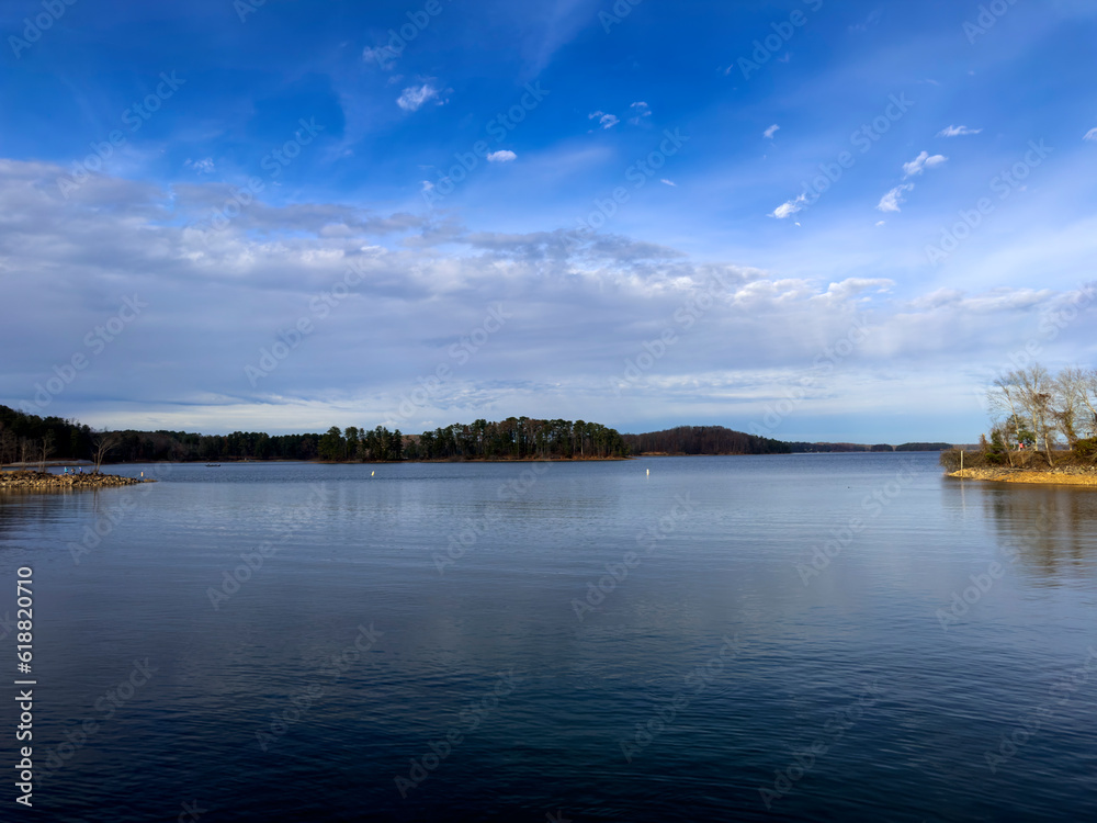 This is the view from the West Bank Park on Lake Lanier in Forsyth County, Georgia.  There are a few clouds on the horizon but it’s a very sunny day.