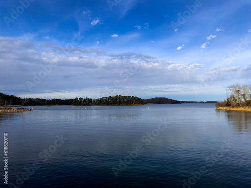 This is the view from the West Bank Park on Lake Lanier in Forsyth County, Georgia. There are a few clouds on the horizon but it’s a very sunny day.