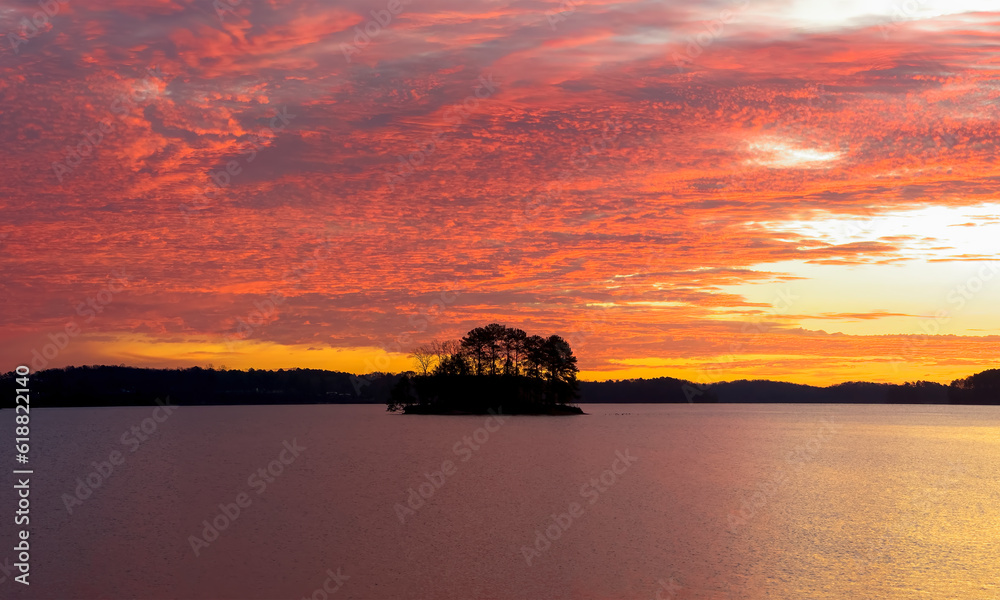 This sunrise was taken from West Bank Park at Lake Lanier.  There were enough clouds to reflect the sunlight but not too many to completely obscure it..