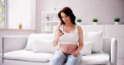 Woman With Gestational Diabetes At Home photo