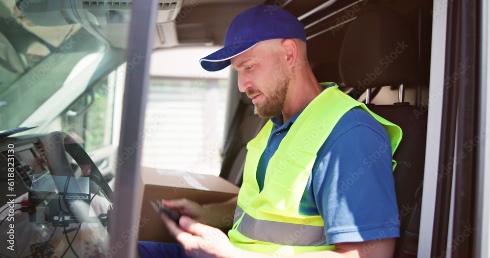 Portrait Of Confident Delivery Man Smiling Portrait Of Confident Delivery Man Smiling