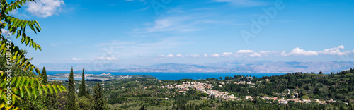 Panorama from the top of the mountain to the city of Kerkyra with the runway of the island of Corfu