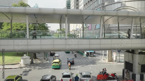 Wallpaper Mural people walking on the pedestrian bridge with intersection down below in downtown Bangkok, Thailand Torontodigital.ca
