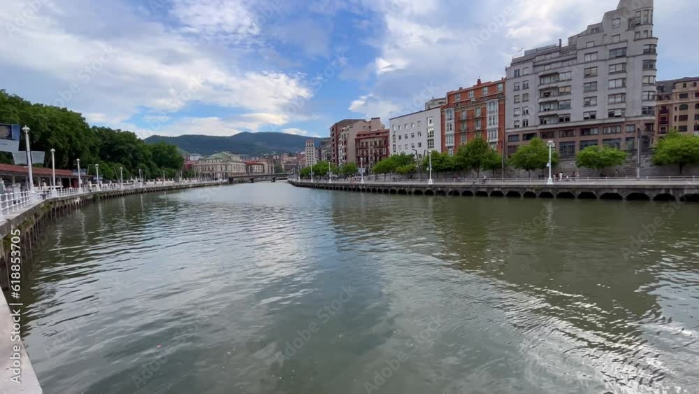 Bilbao downtown with a Nevion River area in Bilbao, Spain during the sunny day Bilbao downtown with a Nevion River area in Bilbao, Spain during the sunny day