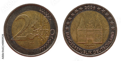 Holsten Gate in Lübeck, Schleswig-Holstein on a two euro coin of Germany with a map of Europe, 2006