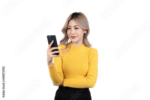 Portrait of a happy asian businesswoman using mobile phone isolated over white background.