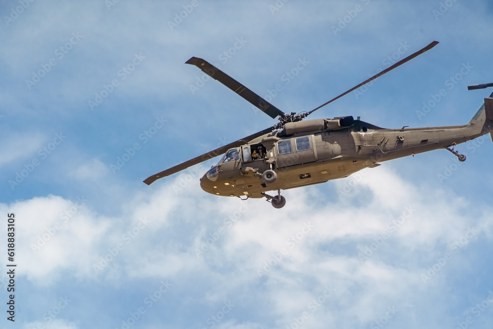 Blackhawk helicopter departing on a mission