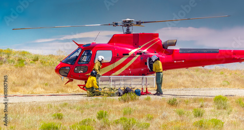 Helicopter and crew fighting a wildfire