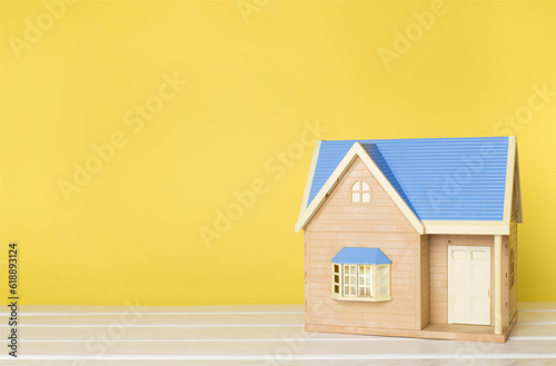 Model of house on wooden table